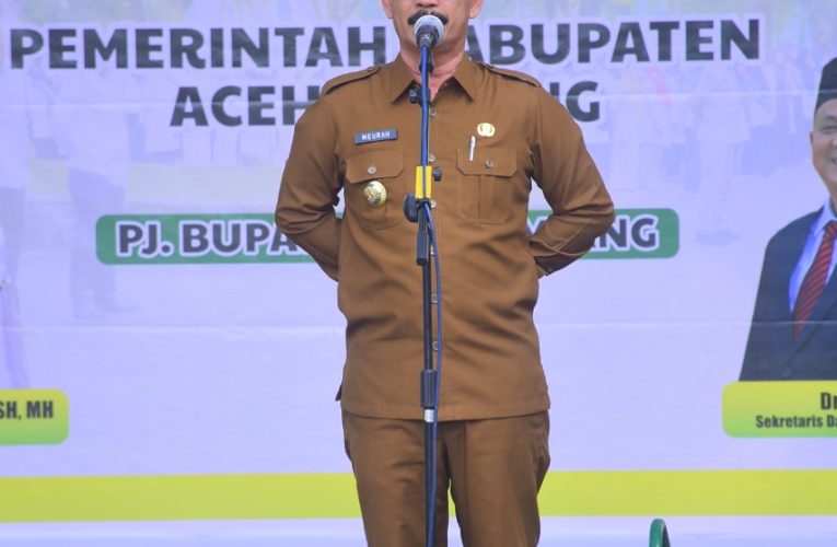 PJ Bupati Aceh Tamiang,Menggelar Apel Akbar Seluruh Aparatur ASN ,DiLapangan Kantor Bupati